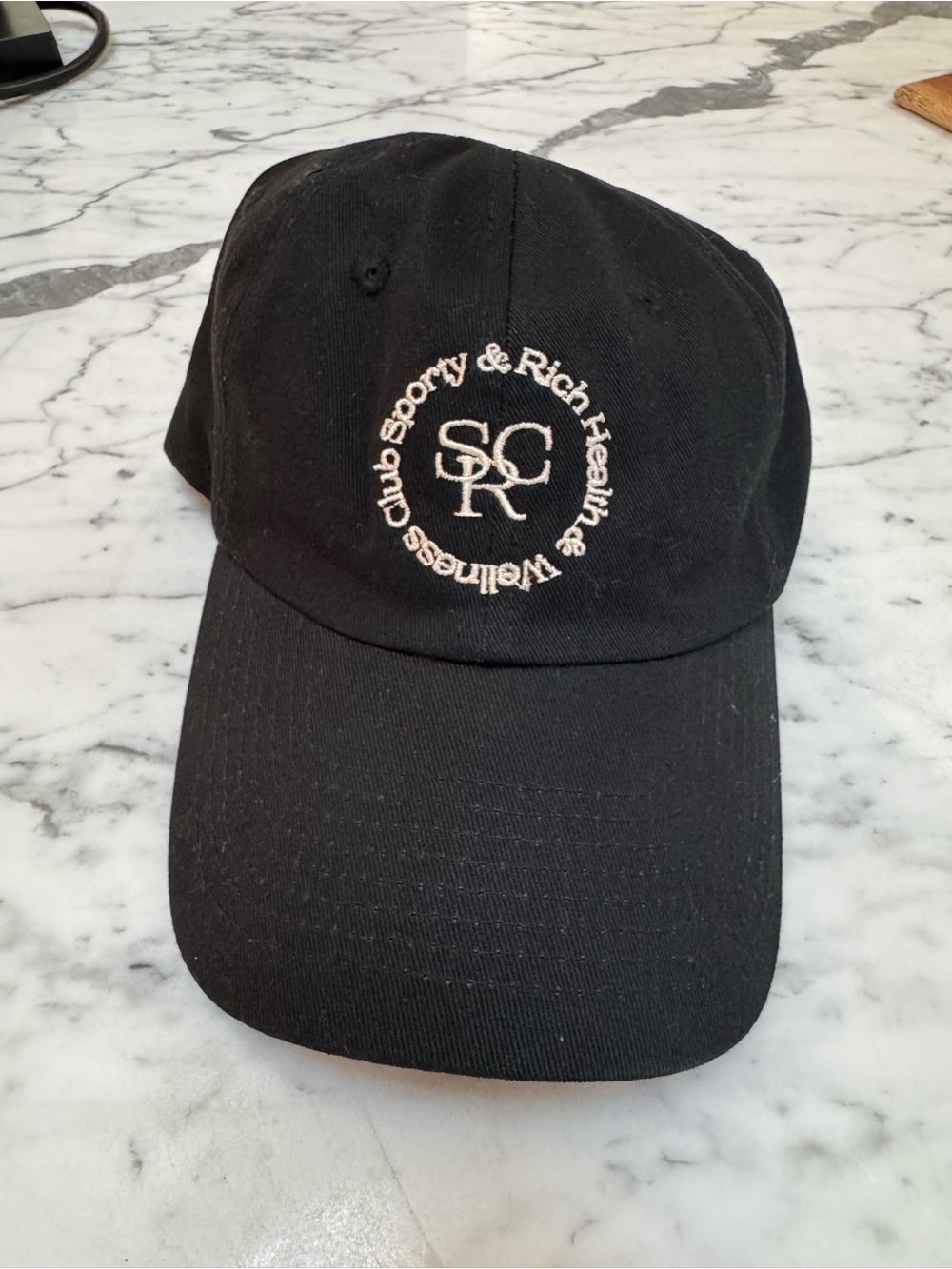 Sporty & Rich Black Baseball Hat with White Embroidery